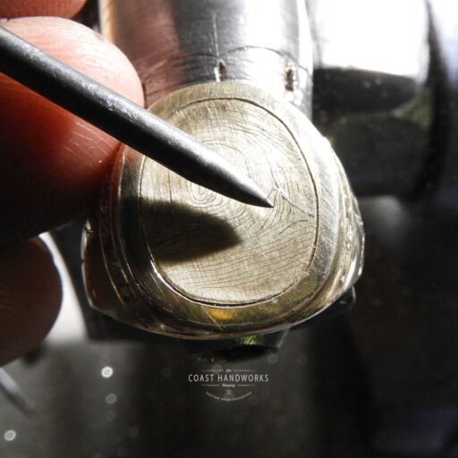 Hand engraving a replica of customer's fingerprint requires some 'CSI' skill in finding and highlighting unique characteristics to be carved in gold Hand engraving a replica of customer's fingerprint requires some 'CSI' skill in finding and highlighting unique characteristics to be carved in gold